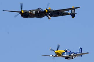 Lockheed P-38J Lightning NX138AM 23 Skidoo and North American P-51D Mustang N5444V Miss Kandy, August 17, 2013